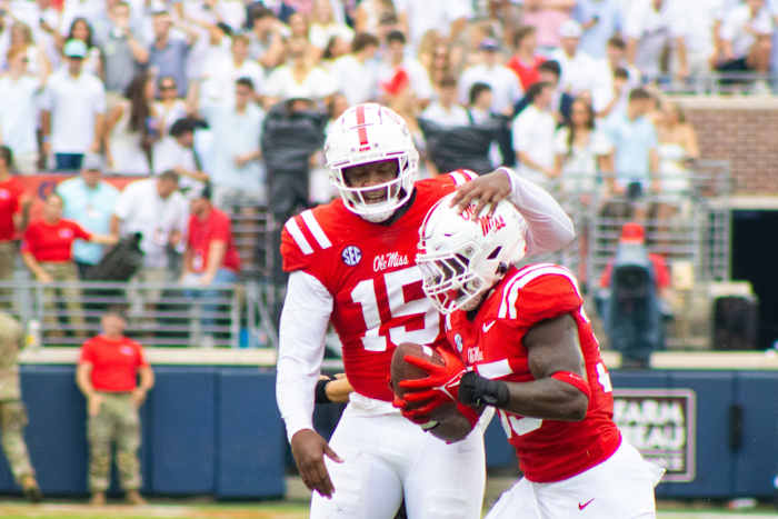 Ole Miss Rebels defensive lineman Jared Ivey celebrates a fumble recovery with running back Fred McAfee (#35) versus the Mercer Bears (2023).